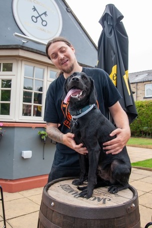 DOG TRIALS: A dog show open to all is being hosted by the landlord of the Cross Keys pub in Darfield. Pictured going through their paces are Tom Bringloe with his dog “Titan” Picture Shaun Colborn PD093441