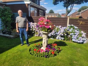 CHALLENGES WELCOME: Terry Wilson in his garden in Monk Bretton.