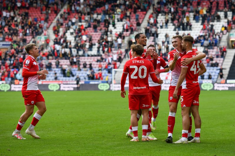 Barnsley celebrate during their 2-0 win at Wigan last August