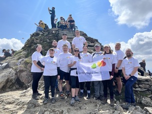 Employees climbing Snowden.