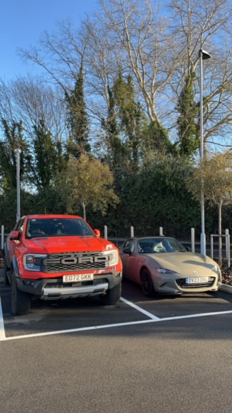 The little Mazda's dinky size when compared to a Ford Raptor