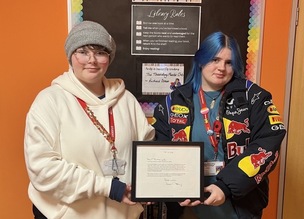 HEARTWARMING: Two students with the letter.