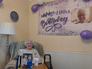 Mary Thickett enjoying her 100th birthday.