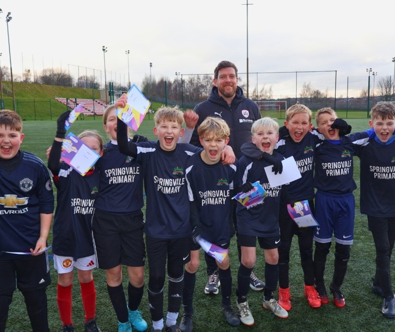 WINNERS: Springvale Primary with Barnsley FC head coach Darrell Clarke.