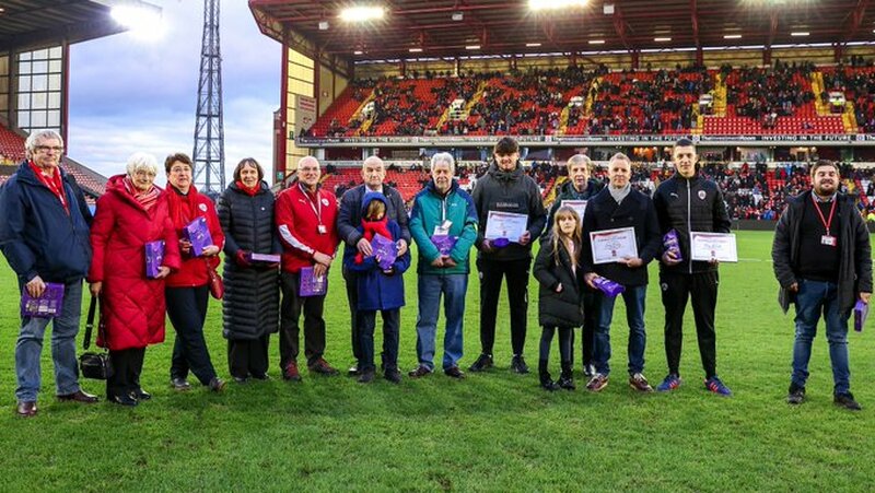 COMMUNITY HEROES: The group were honoured at Oakwell on Saturday.