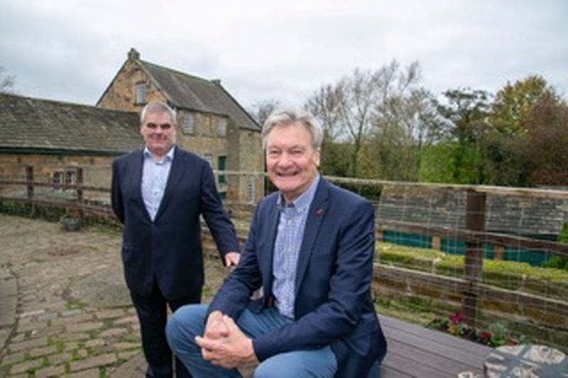 BIG YEAR: Couns John Clarke and Roy Bowser at the mill, which celebrates its 400th birthday in 2025.