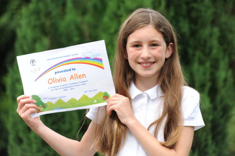 Main image for Olivia leaves school with 100 per cent attendance