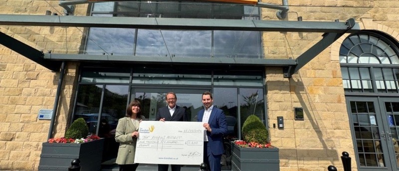 Amanda Holmes and James Shepherd, trustees of the Dransfield Foundation and Martin Sawdon MBE (centre) from the Exodus Project.