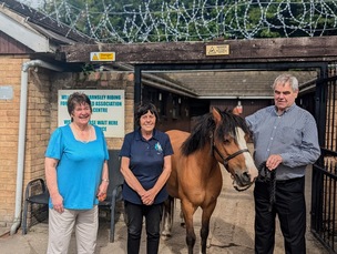 Catherine Mitchell (centre), with members of the Dove Valley Event Group Tricia Wilson (left) and John Clarke (right).