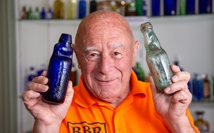 LOTTA BOTTLE: A rare blue Codd bottle has fetched a unbelievable £33,000 at a recent auction, held at Elsecar, Alan Blakeman with the ultra rare codd bottle. Picture Shaun Colborn PD093327