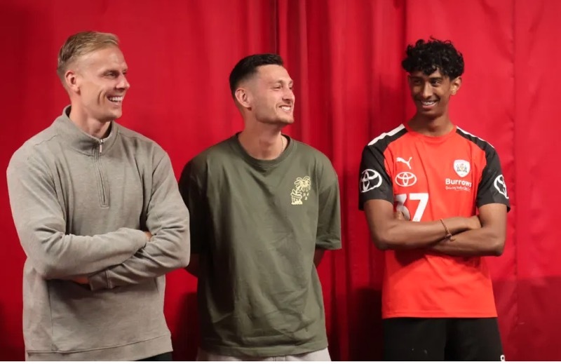 COMMUNITY: Barnsley FC players Marc Roberts, Jackson Smith and Vimal Yoganathan.