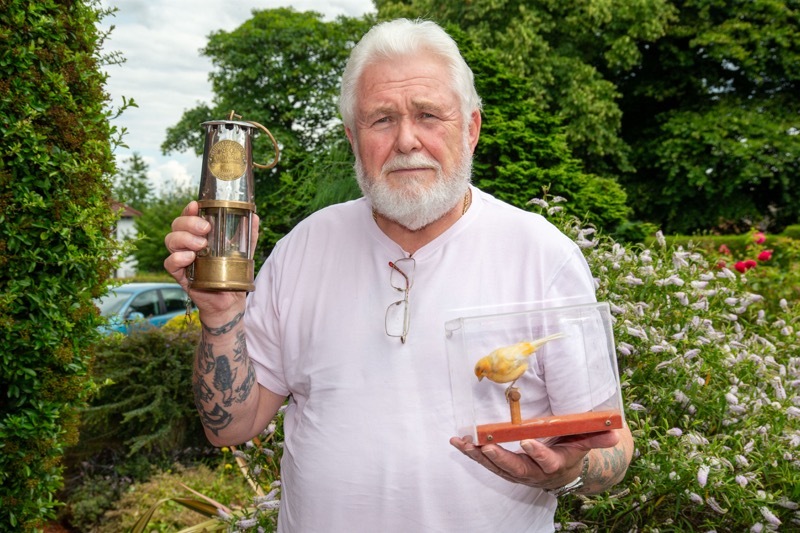 MINING MEMORIES: John Greaves with some his mining memorabilia, Picture Shaun Colborn PD093325