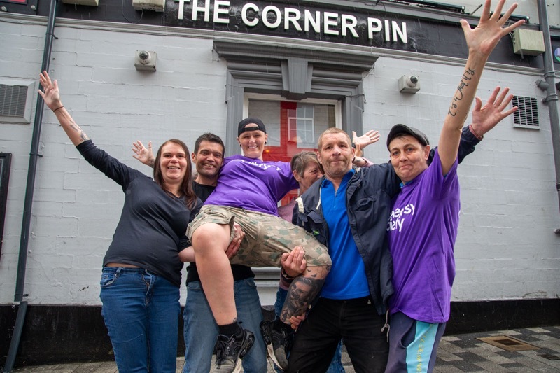 FUNDRAISERS: Corner Pin landlady Jyneen Haughie with some of her regulars.