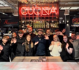 FINAL NIGHT: Owner Alessandro Vergine with Cucina’s staff on their final night last weekend.
