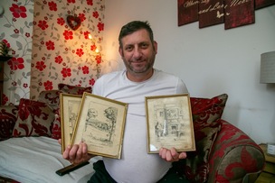 MEMORIES: Shaun Welbourn with what he believes are sketches from the Chronicle in the 1930s.