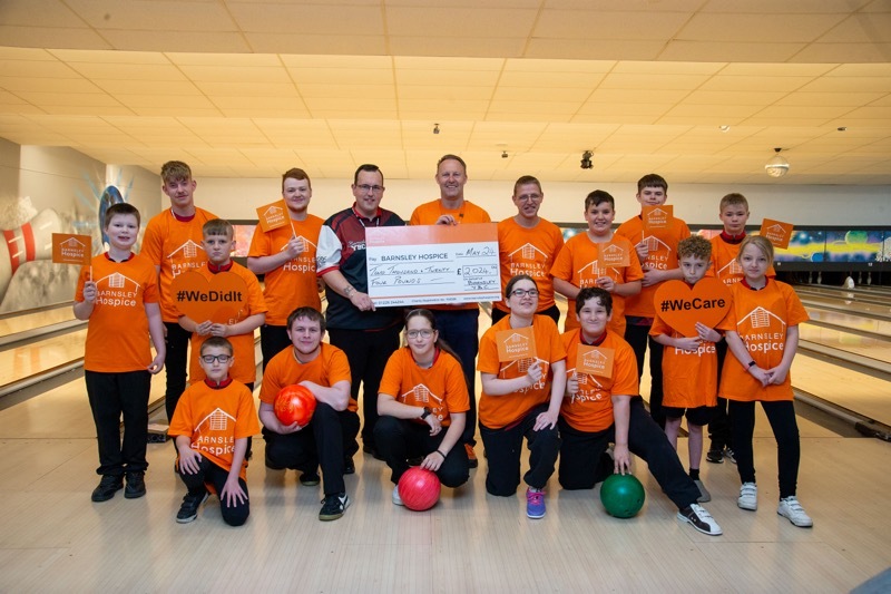 MONEY TO DATE: Barnsley bowling club matched the year by raising £2024 for the Hospice charity. Picture Shaun Colborn PD093202