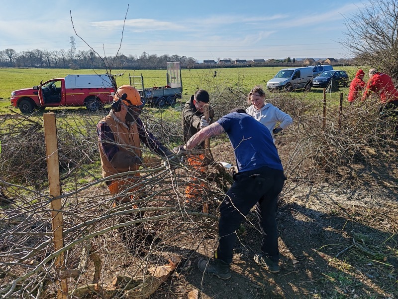 HARD AT WORK: The South Area Team’s employees get to grips with their new natural boundary.