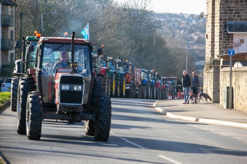 SPECIAL FUNERAL: Tractors brought traffic in parts of Barnsley to a standstill as part of a funeral escort for 15-year-old Jack Allott. Picture Shaun Colborn PD093935