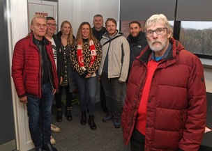 MIRACLE: Michael with his son, John, brother Nigel, nephew Michael, Phil McNulty, Kat Abbott, Terri Anderson and Nathan Sinclair.