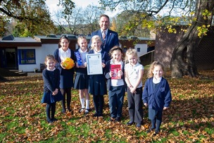 AWARD WINNING: Cawthorne primary Head teacher Adam Bramhall, with some of the female footballers, that Adam won an award for the school, for promoting Girl football. Picture Shaun Colborn PD093657