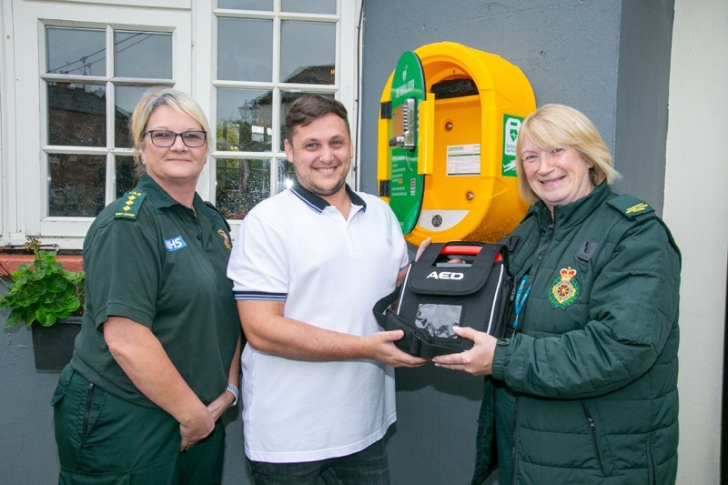 HEART OF COMMUNITY; Pub Landlord Daniel Lawrence along with NHS Staff Caz Brown, and Yvonne Hargreaves community defib trainer. Picture Shaun Colborn PD093564