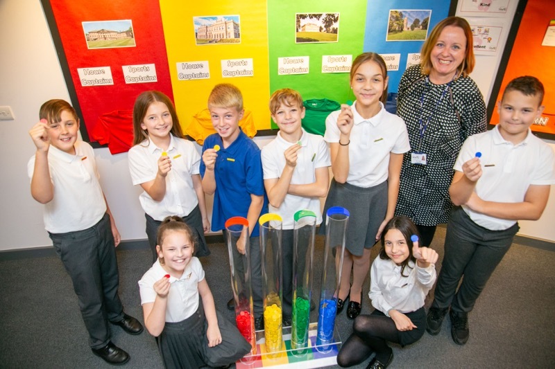 Head teacher Karen Brown, with some of her pupils enjoying the legacy that the late Coun Charlie Wraith left to the school. Picture Shaun Colborn PD093565