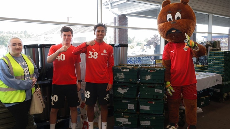 SUPPORT: The foodbank’s Georgina Arnold alongside Theo Chapman, Aaron Atkinson and Toby Tyke.