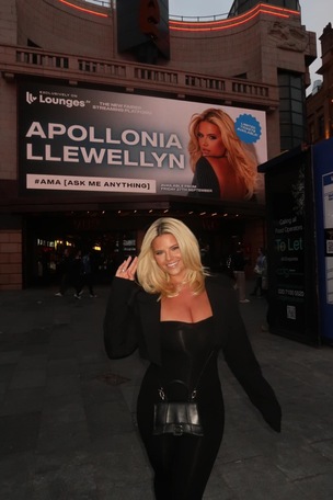 BIG TIME: Apollonia next to her billboard.