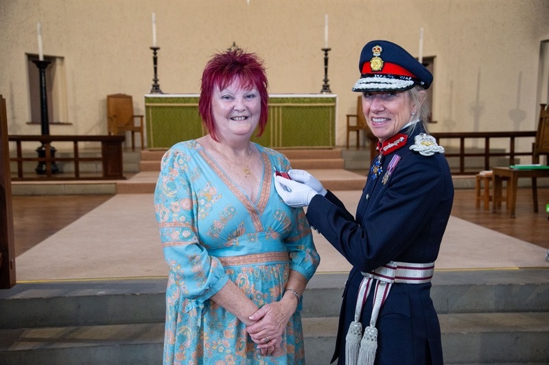 EMPIRE MEDAL: Cheryl Sanderson with her British Empire Medal. Picture Shaun Colborn PD093457