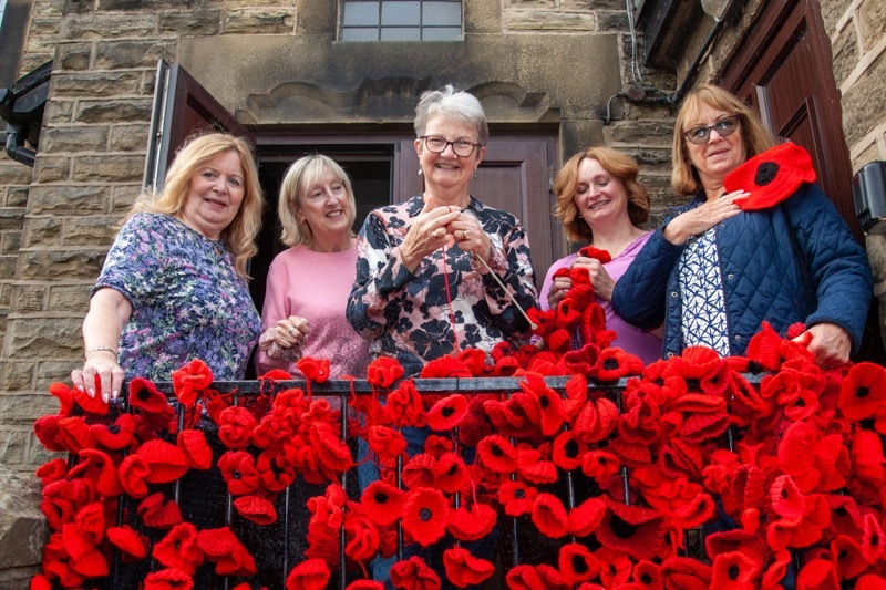 POPPY KNITTING: Cawthorne community crafters are at it again, making a giant poppy display to adorn the memorial statue in the village. pictured are Shirley Robinson, chris bedford, sue hardy,sally briggs and margaret reed.