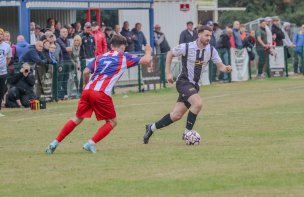 Dearne and District in action against Brigg Town.